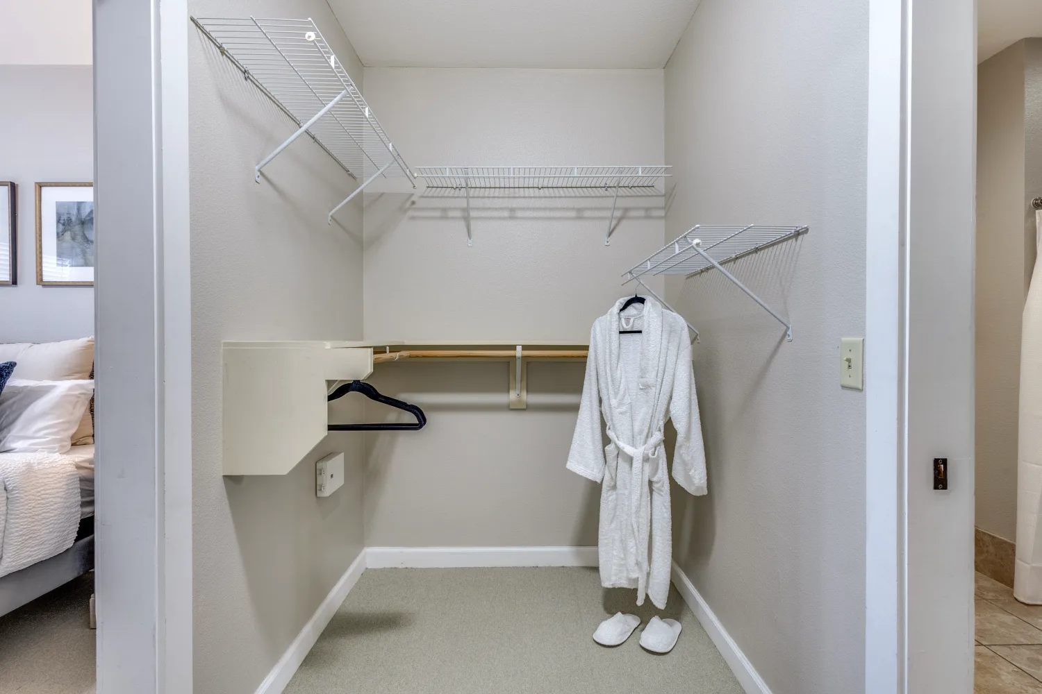 Senior living apartment walk in closet with storage shelving at The Ivy of McKinney assisted living community Texas